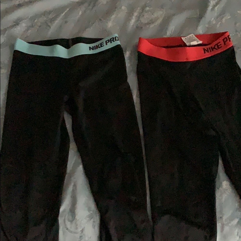 Two Nike Pro Leggings